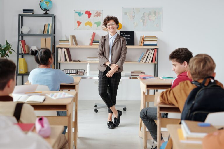 Teacher discussing the recommendation letter for college admissions with her students